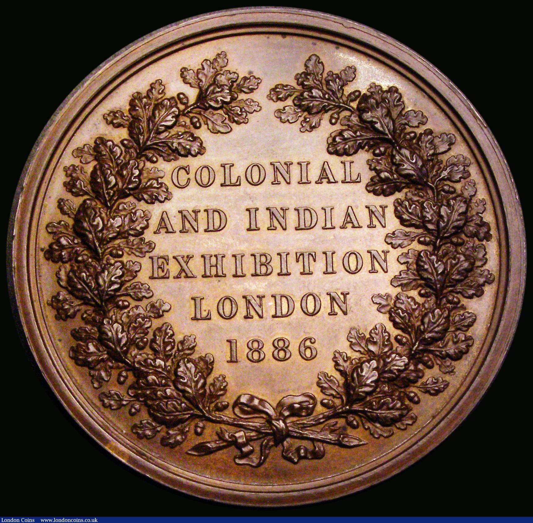 London Coins : A186 : Lot 803 : Colonial and Indian Exhibition, London 1886 52mm diameter in bronze by L.C. Wyon, Obverse: Bust left...