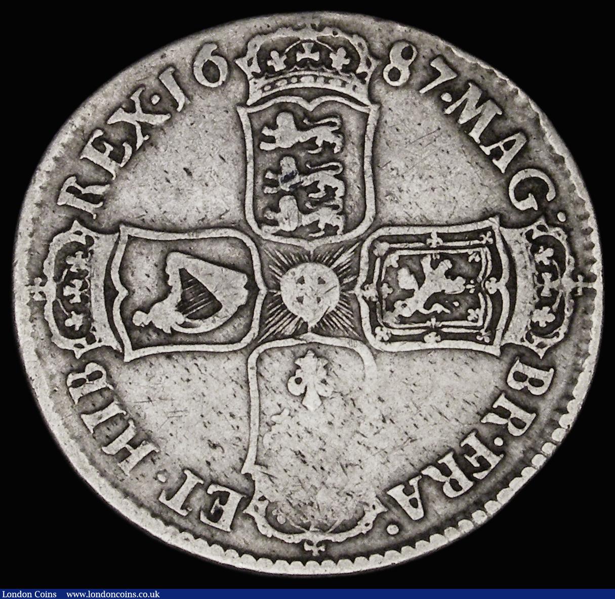 London Coins : A187 : Lot 2043 : Halfcrown 1687 First Bust, TERTIO edge, ESC 498, Bull 753, VG, the reverse slightly better, the obve...