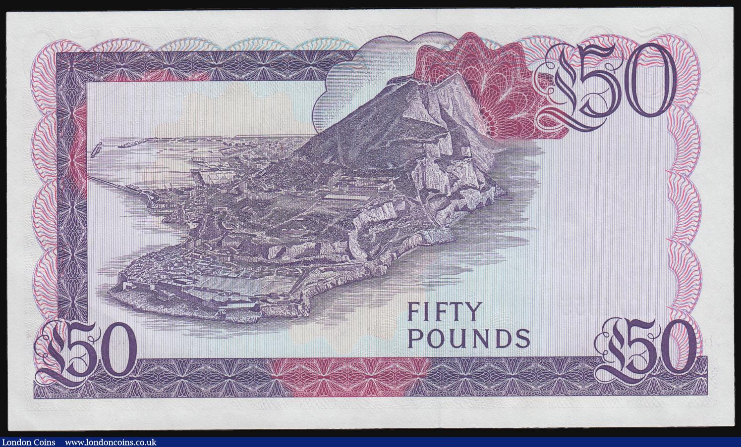 London Coins : A187 : Lot 302 : Gibraltar 50 Pounds Pick 24 dated 27th November 1986 signature B. Traynor serial number A 074055, ab...