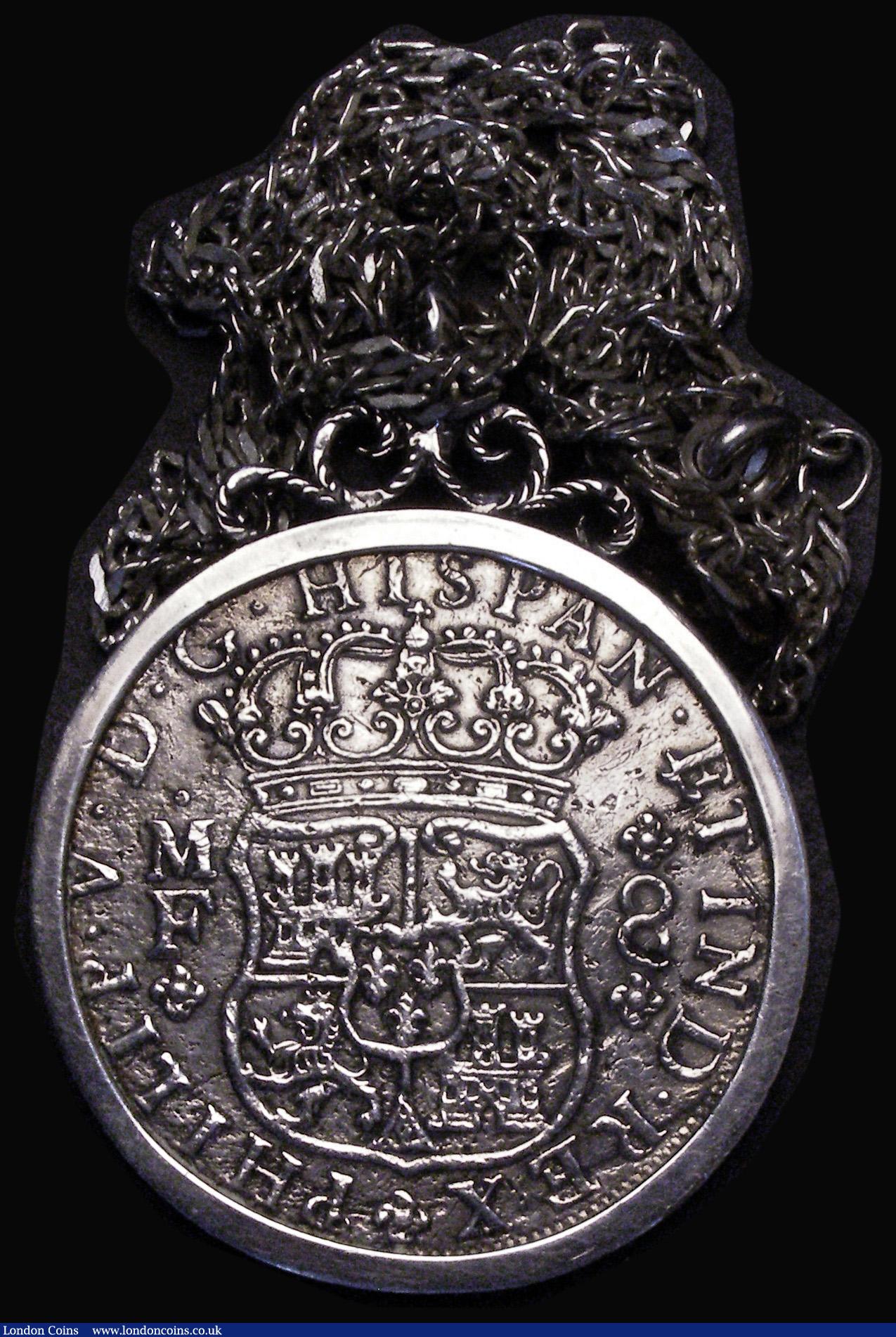 London Coins : A189 : Lot 1079 : Mexico Eight Reales 1738 MF KM#103 in a pendant in a silver mount on a chain, the edge of the mount ...