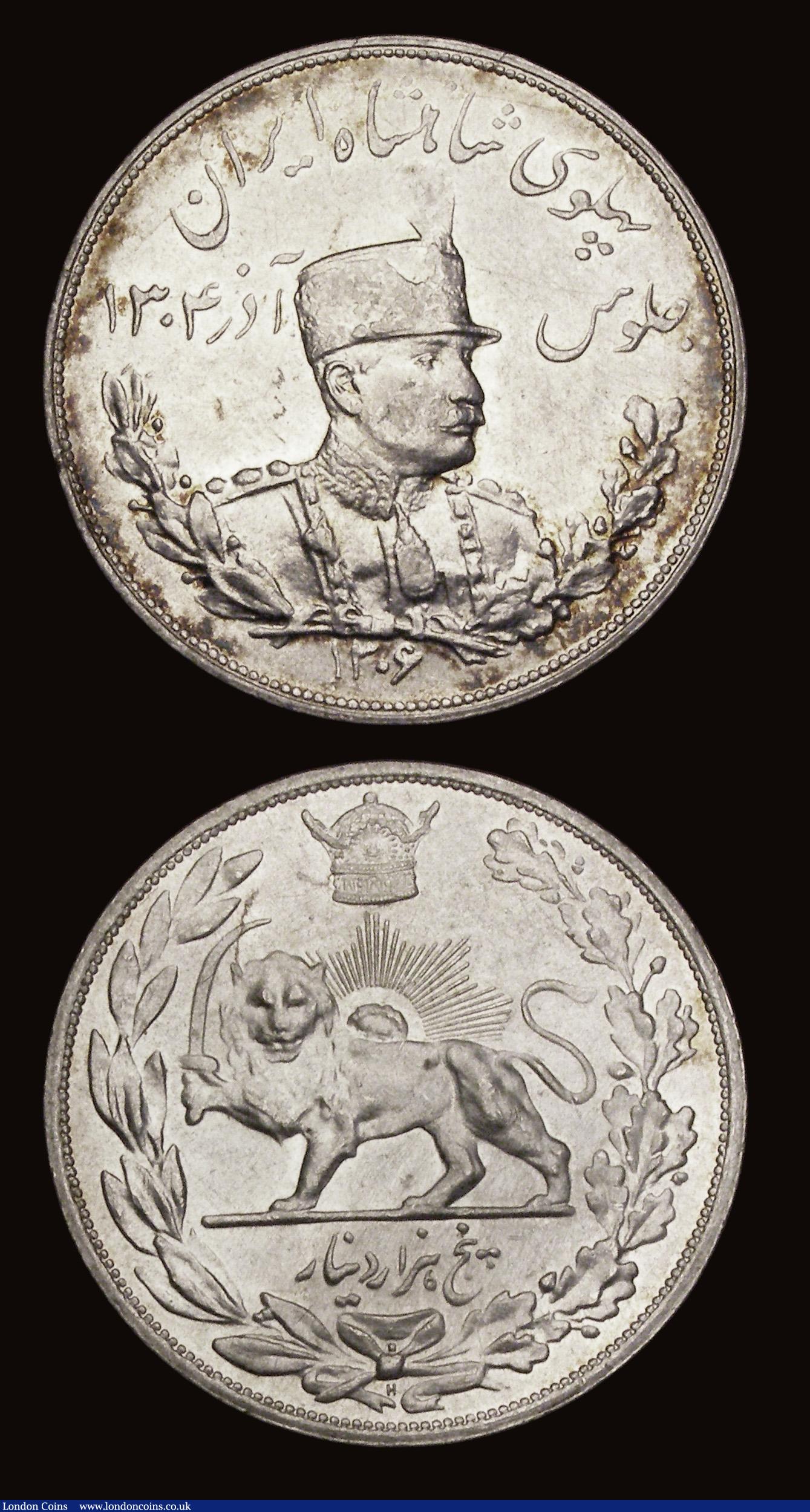 London Coins : A191 : Lot 1012 : Iran 5,000 Dinars (2) AH1320 (1902) KM976 and SH1308 (1929) KM1106 both EF or near so, the 1902 with...