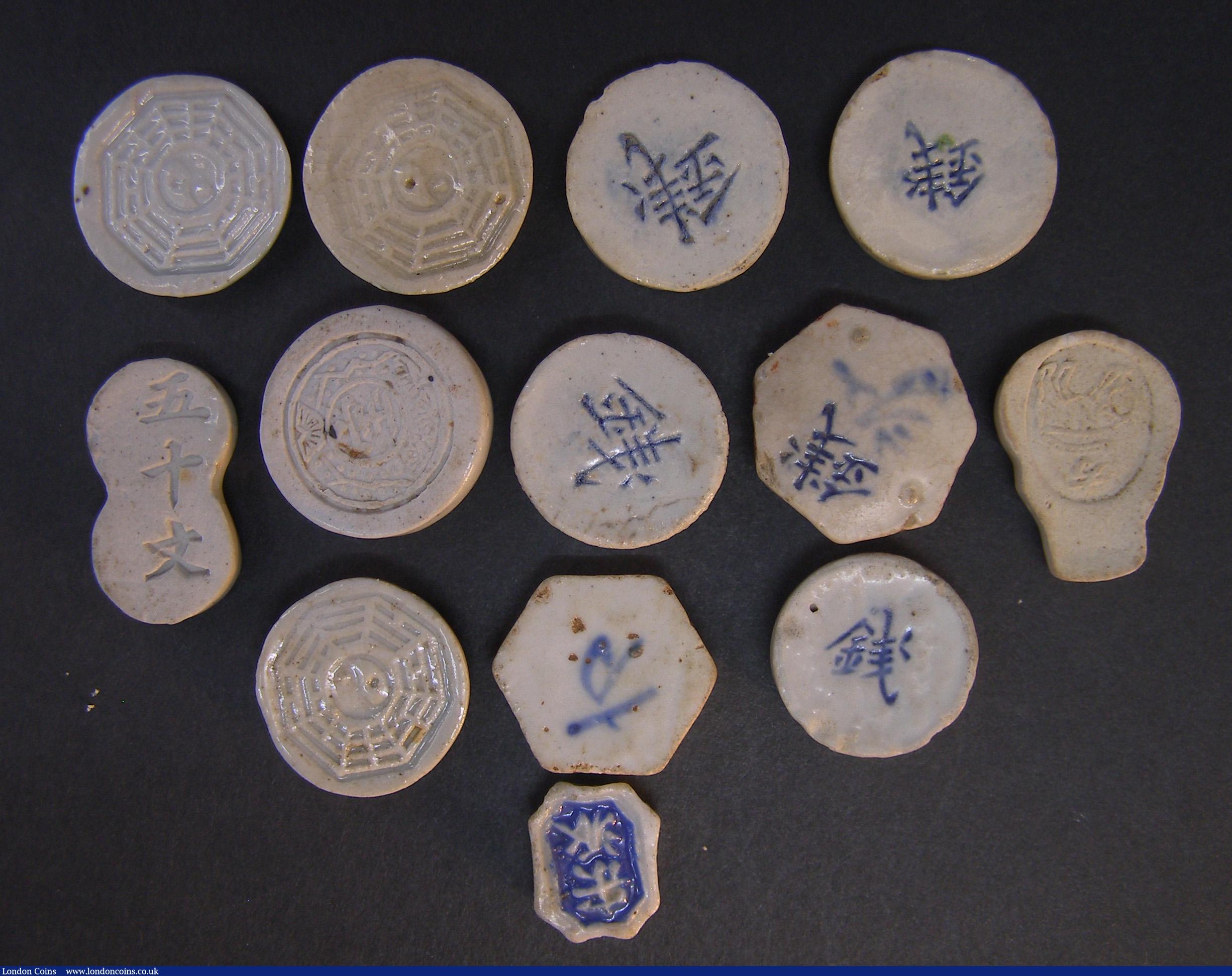 London Coins : A191 : Lot 2365 : China/Siam Porcelain Gambling Tokens (13) all different types some with animals VF