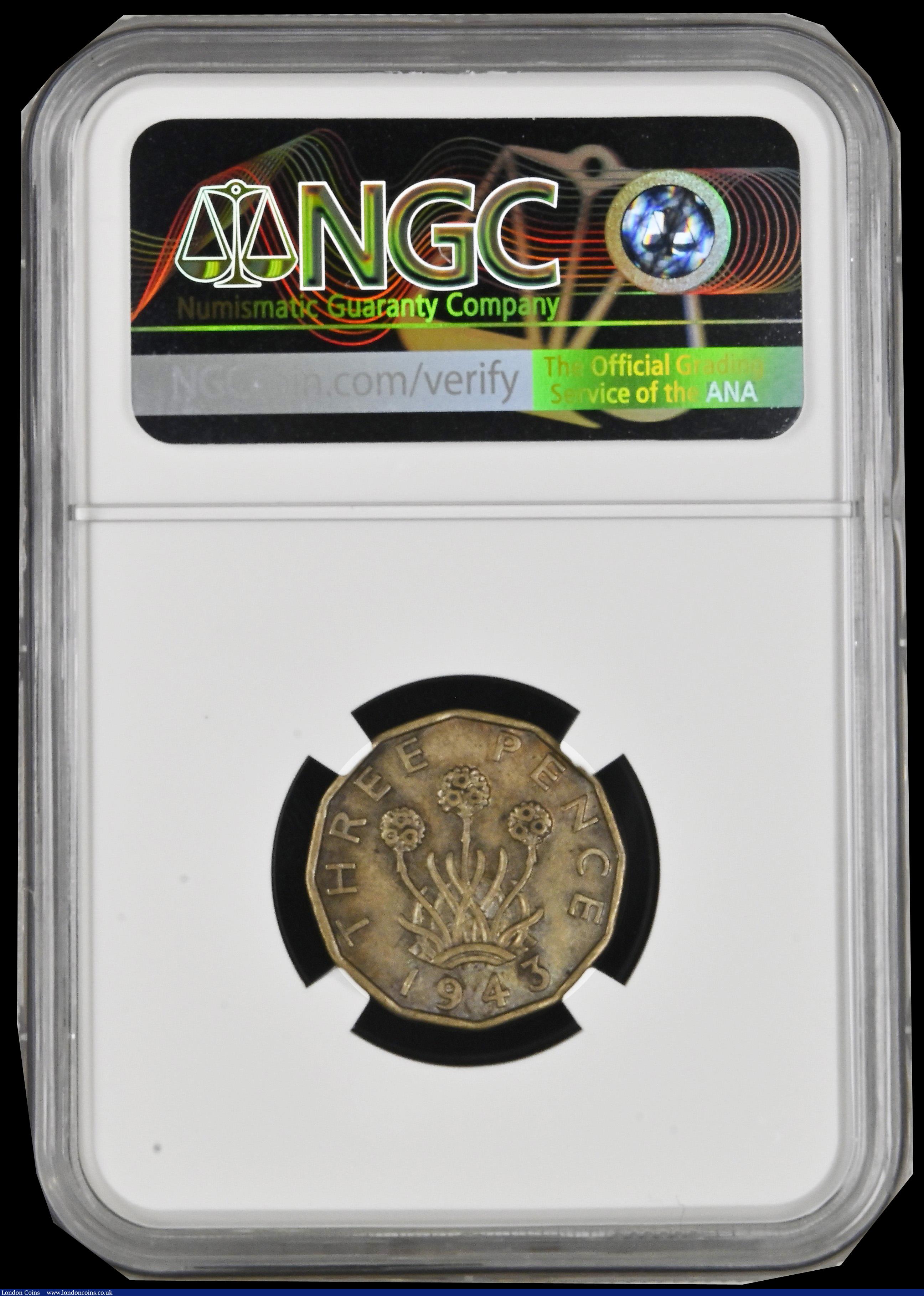 London Coins : A192 : Lot 488 : Mint Error Laminated Planchet - GB Brass Threepence 1943 with a long lamination across the obverse i...