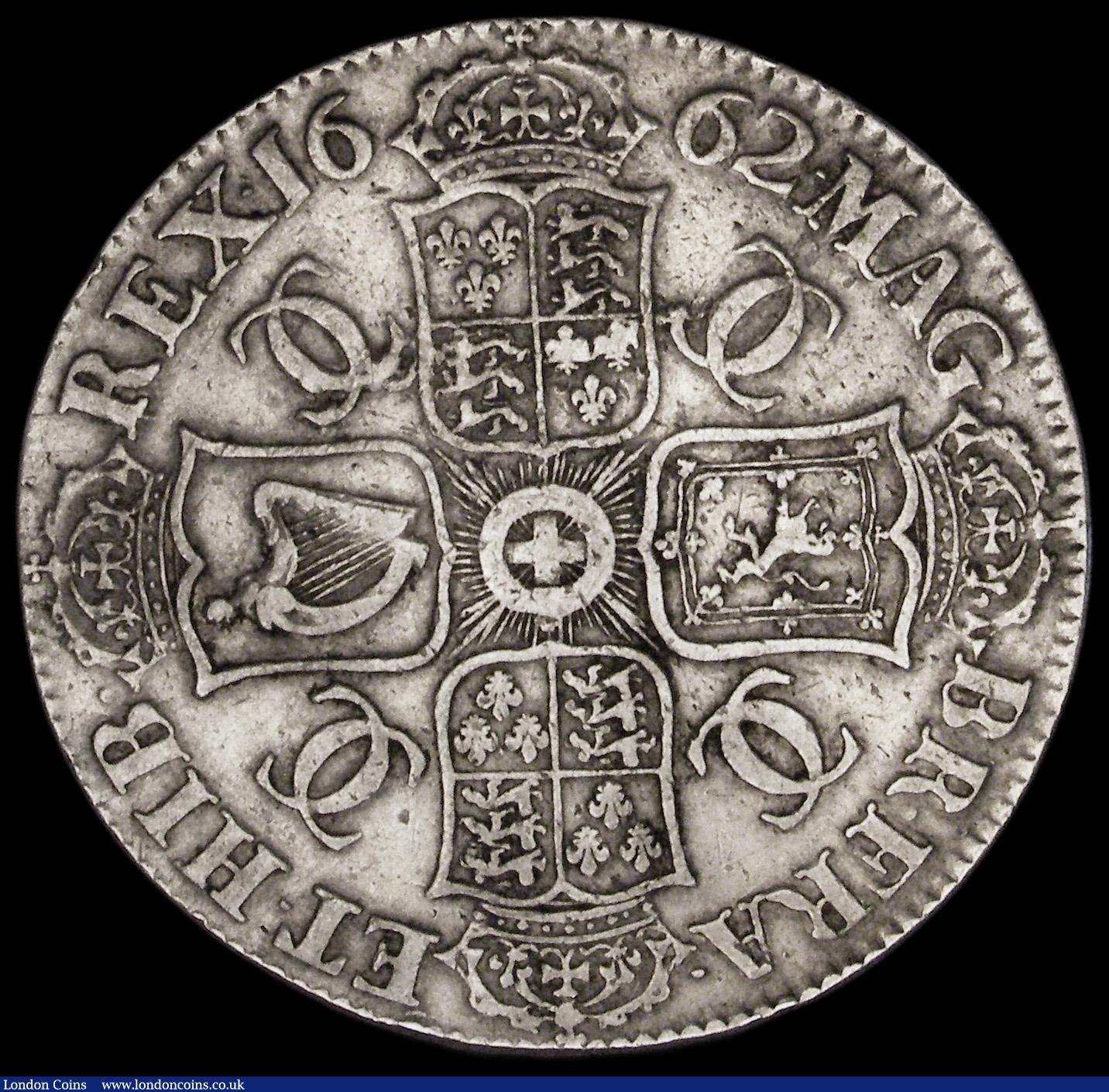 London Coins : A193 : Lot 1079 : Crown 1662 Rose below bust, 1662 on edge, ESC 17, Bull 344, Good Fine, the obverse with some thin sc...