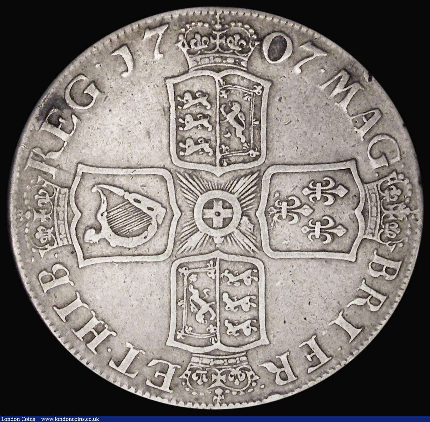 London Coins : A193 : Lot 1096 : Crown 1707E SEXTO edge ESC 103 Bull 1352 pleasant Fine