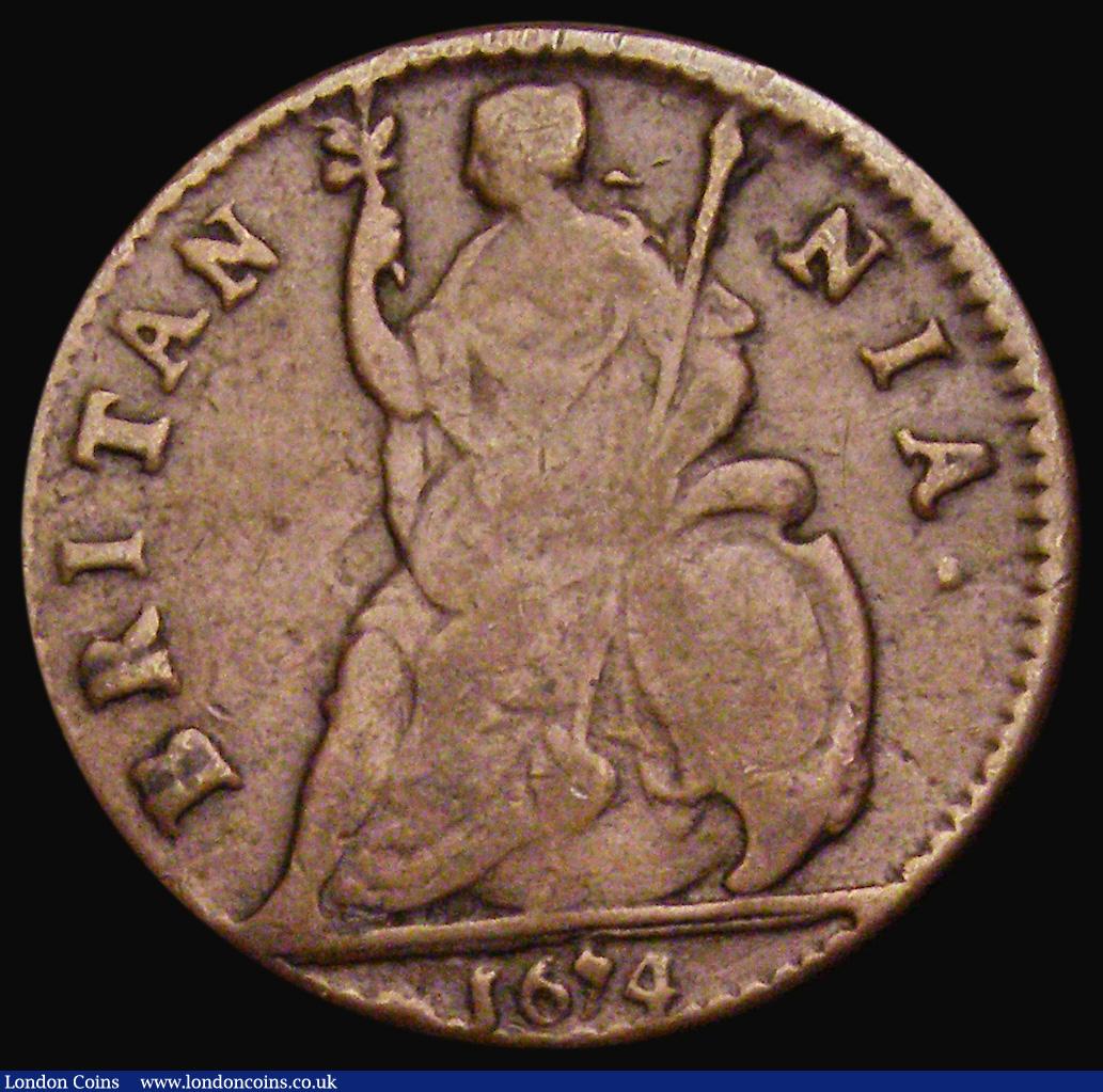 London Coins : A193 : Lot 1210 : Farthing 1674 C over reverse C in CAROLVS and thus appearing OAROLVS, as Cooke collection no.725, un...