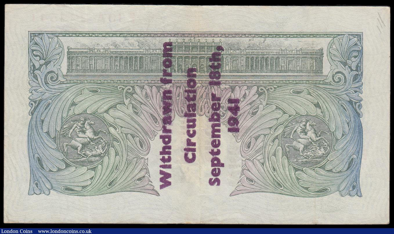 London Coins : A193 : Lot 20 : One Pound Peppiatt B239A Guernsey overprint series E10A 228541, "Withdrawn from circulation Nov...