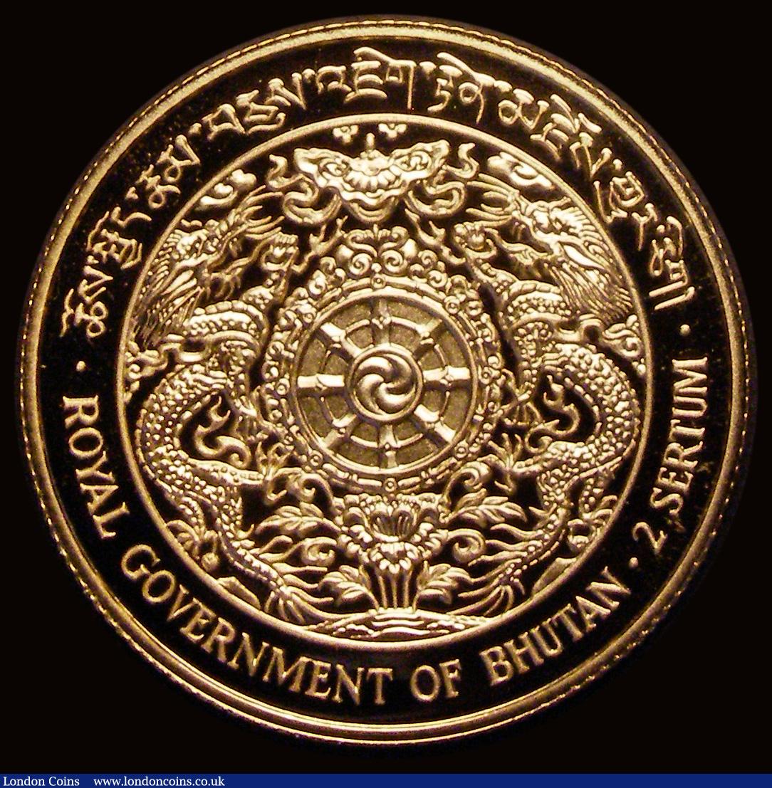 London Coins : A193 : Lot 691 : Bhutan 2 Sertums 1979 Gold, Obverse: Crowned Bust left, Reverse: Two Dragons around an inner circle ...