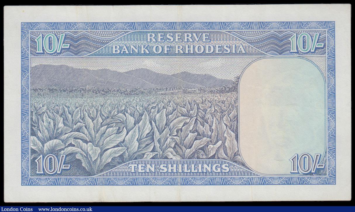 London Coins : A194 : Lot 106 : Rhodesia 10 Shillings blue Young QE II at right 1 June 1966 red serial number L/11 918151 Pick 27a E...