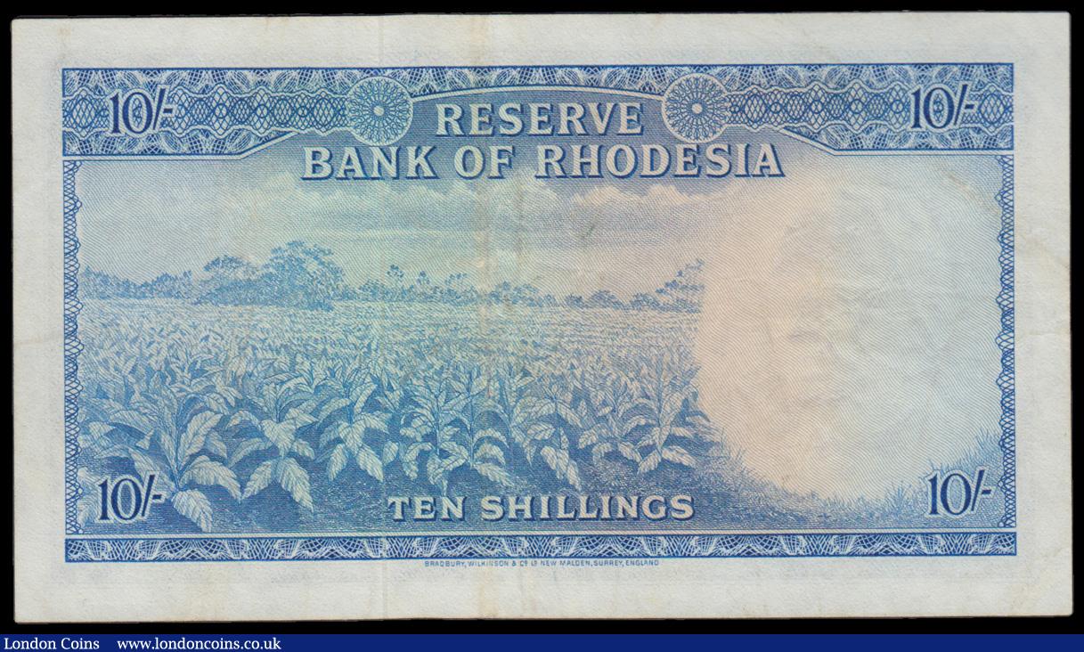 London Coins : A194 : Lot 107 : Rhodesia 10 Shillings blue Young QE II at right 30 Sept 1964 black serial number H/1 043146 Pick 24a...