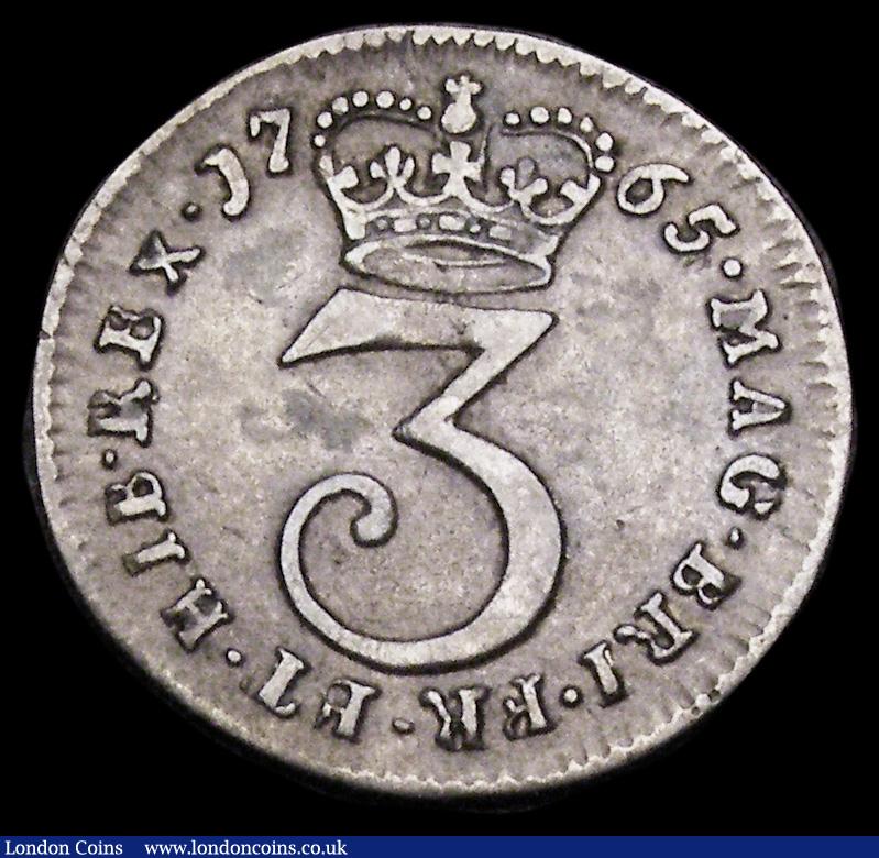 London Coins : A194 : Lot 1421 : Maundy Threepence 1765 ESC 2035 Good Fine/Fine, with grey tone, the 5 in the date with traces of an ...