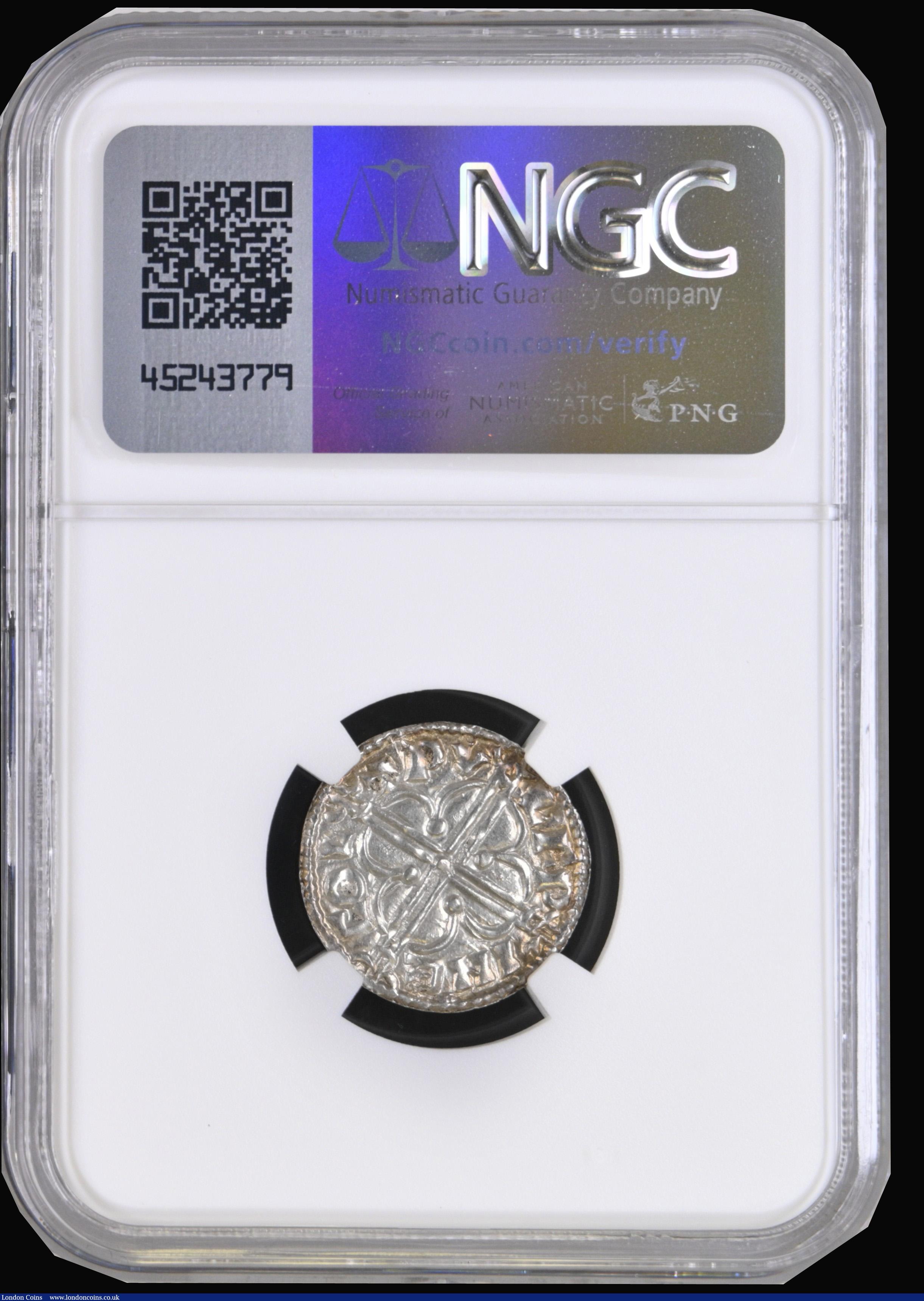 London Coins : A194 : Lot 807 : Penny Cnut Quatrefoil type S.1157 Colchester Mint moneyer WULFWINE Lustrous with a peripheral gold t...