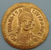 London Coins : A122 : Lot 1131 : Anastasius (AD491-518) gold Solidus. Helmeted and cuirassed bust facing holding spear and shield. R....