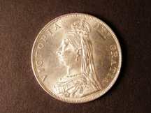 London Coins : A124 : Lot 243 : Double Florin 1887 Arabic 1 in date ESC 395 Lustrous UNC with relatively few contact marks, a mo...