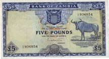 London Coins : A126 : Lot 386 : Zambia £5 issued 1964, prefix C/2, wildebeest at right, Pick3a, pressed, a...