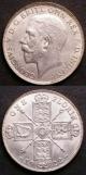 London Coins : A142 : Lot 2204 : Florins (2) 1922 ESC 941 UNC nicely toned with a few light contact marks, 1923 ESC 942 UNC or ne...