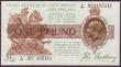 London Coins : A144 : Lot 84 : One pound Bradbury T16 issued 1917 first series A/94 135111, cleaned & pressed, VF-GVF but looks...