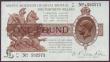 London Coins : A144 : Lot 96 : One pound Warren Fisher T34 issued 1927 series T1/21 592573, No. with dot, Northern Ireland in title...