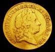 London Coins : A153 : Lot 2207 : Guinea 1715 Third Laureate Head S.3630 About Fine with some scratches and light smoothing in the obv...