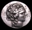 London Coins : A154 : Lot 1562 : Thrace, Thasos Tetradrachm, mid 2nd Century BC, Obv. Wreathed head of Dionysus, Reverse Hercules sta...