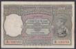 London Coins : A155 : Lot 1881 : India 100 rupees KGVI issued 1943 series B/19 134120, Calcutta branch, signed Deshmukh, Pick20e, mul...