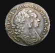 London Coins : A155 : Lot 665 : Sixpence 1694 ESC 1531 NEF toned the obverse with a small striking flaw by GVLI, Very rare in this h...