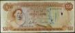 London Coins : A157 : Lot 105 : Bahamas Government $50 issued 1965 series A081374, Pick24a, two holes at right, penned numbers on fa...