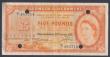 London Coins : A157 : Lot 112 : Bermuda &pound;5 dated 1952 series E/1 485718, a normal issued note used as a SPECIMEN with 4 punch ...