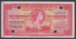 London Coins : A157 : Lot 113 : Bermuda 10 shillings dated 1952 series G/1 669720, a normal issued note used as a SPECIMEN with 4 pu...