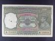 London Coins : A157 : Lot 164 : India 100 rupees KGVI issued 1943 series A/88 218203, Calcutta branch, signed Deshmukh, Pick20e, sta...
