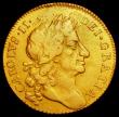 London Coins : A162 : Lot 1752 : Guinea 1677 as S.3344 the first 6 of the date with an extra line showing at the top left of the curv...