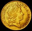 London Coins : A162 : Lot 1762 : Guinea 1722 S.3631 Good Fine, the obverse with evidence of double striking, the reverse shows eviden...
