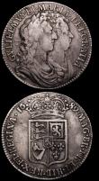 London Coins : A164 : Lot 1146 : Halfcrowns (2) 1689 First Shield, Caul only frosted, with Pearls, First V of GVLIELMVS over A or inv...