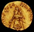 London Coins : A164 : Lot 402 : Indo-Scythian Kings, Quarter Dinar, Kushans, Kanishka I (127-140AD) Obverse: Kanishka standing facin...