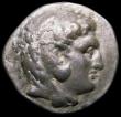 London Coins : A167 : Lot 328 : Ancient Greece Ar Tetradrachm. Macedon. Philip III 323-317BC. Obverse: Head of Herakles right, weari...
