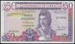 London Coins : A175 : Lot 107 : Gibraltar 50 Pounds Pick 24 dated 27th November 1986 signature B. Traynor serial number A 076639, ab...