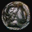 London Coins : A176 : Lot 1098 : Ancient Greece - Macedonia Hemiobol, Ae17, Philip II Obverse: Laureate head of Apollo right , Revers...
