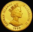 London Coins : A176 : Lot 870 : Cayman Islands $250 Gold 1990 Reverse: Spitfires in flight/Vignette of Churchill, One Ounce of .999 ...