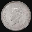 London Coins : A176 : Lot 935 : India Half Rupee 1939 Calcutta Mint, Short Trefoils, KM#550, PR#364 in an NGC holder and graded MS62...