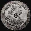 London Coins : A179 : Lot 1510 : Dollar George III Oval Countermark on a Mexico City 8 Reales 1796 FM Mo ESC 129, Bull 1852, Counterm...