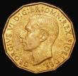 London Coins : A180 : Lot 1222 : Brass Threepence 1950 Peck 2394 AU/UNC the obverse with subdued lustre, the reverse with around 50% ...