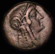London Coins : A181 : Lot 1267 : Ptolemaic Kingdom of Egypt, Ae26, Ptolemy IV (222-204BC) Obverse: head of Cleopatra as Isis right, w...