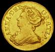 London Coins : A184 : Lot 1659 : Guinea 1714 Queen Anne S.3574 VF the obverse with some very light haymarking and an edge nick, the r...