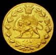 London Coins : A189 : Lot 1028 : Iran 5000 Dinars Gold (Half Toman) AH1330 KM#1067 GVF the obverse with some flan flaws