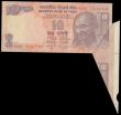 London Coins : A194 : Lot 87 : India - Error 10 Rupees orange on white Gandhi at right red S/N 00G 736748, tiger before elephant re...